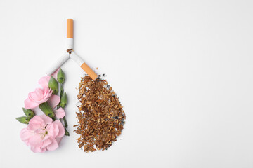 No smoking concept. Lungs made of dry tobacco, cigarettes and pink flowers on white background,...