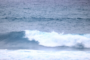 Naklejka na ściany i meble wave in the ocean abstract background, blue sea texture motion