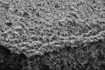 sea waves foam drone view abstract background ocean top