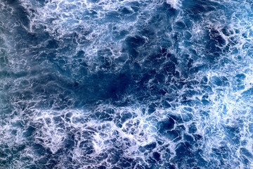 sea waves foam drone view abstract background ocean top