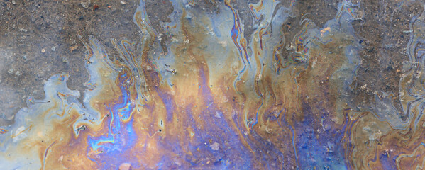 spilled gasoline rainbow background, industrial hazard spill pollution, abstract texture...