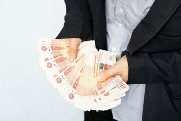 Businessman counting money, Russian Ruble currency financial and wealthy concepts