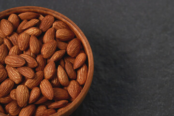 Almonds in a wooden cup