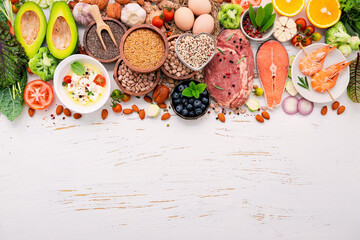 Ketogenic low carbs diet concept. Ingredients for healthy foods selection set up on white wooden background. - 572832537