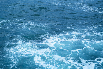 Naklejka premium Ocean surface. Abstract water background. Wave pattern.