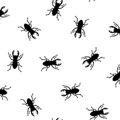 Seamless pattern with simple silhouettes of stag beetles,