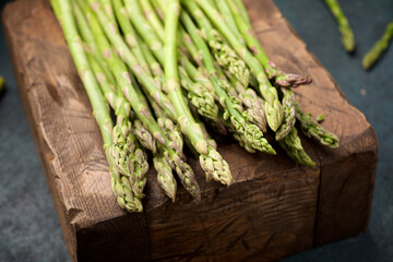 Green asparagus in a wood box