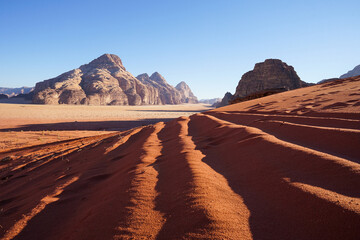 Fototapeta na wymiar Wadi Rum Desert with red sand dunes, beautiful tourist destination, Wadi Rum, Jordan
