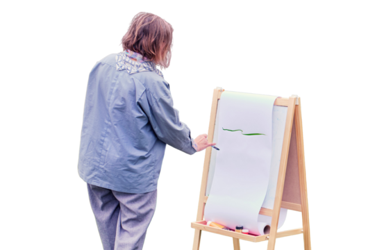 Happy woman draws on the easel with a brush and paints, isolated on a white background. Woman artist draws nature and trees on paper by the water on the river bank - Powered by Adobe