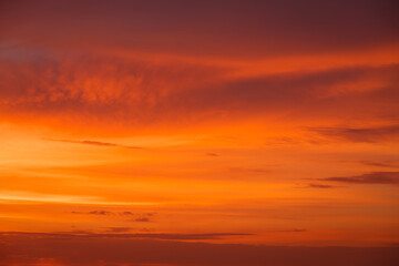 Naklejka na ściany i meble Beautiful colorful dramatic sky with clouds at sunset or sunrise. Abstract sky background
