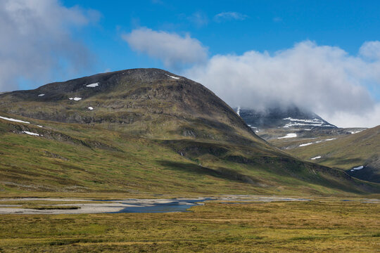 Rivers flow through Tj&Atilde;&curren;ktjavagge valley south of S&Atilde;&curren;lka hut, Kungsleden trail, Lapland, Sweden