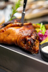 Roasted pork knuckle eisbein with braised boiled cabbage