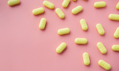 Vitamin capsules, pills or dietary supplement supports for health.
