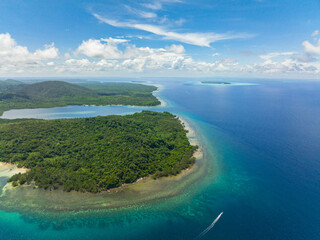 Aerial view of Balabac island with tropical forest and blue sea. Palawan. Philippines.