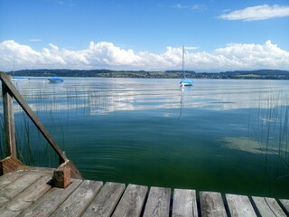 wooden bridge over lake in Switzerland