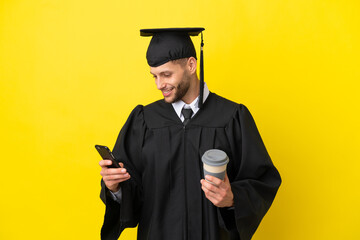 Young university graduate caucasian man isolated on yellow background holding coffee to take away...