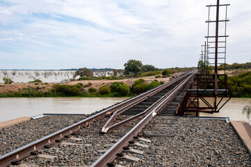 Menindee Australia, view along train tracks beside lake