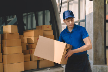 Asian delivery man, delivery men unloading cardboard boxes from truck.