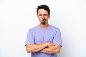 Young man with moustache isolated on white background with unhappy expression