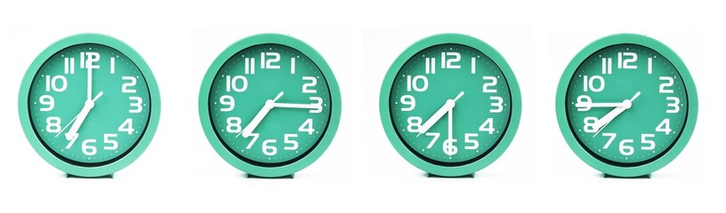 close up of a set of green clocks showing the time; 7, 7.15, 7.30 and 7.45 p.m or a.m. Isolated on white background - obrazy, fototapety, plakaty