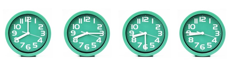 close up of a set of green clocks showing the time; 8, 8.15, 8.30 and 8.45 p.m or a.m. Isolated on white background - obrazy, fototapety, plakaty