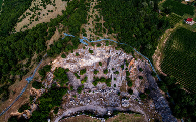 Amazing geologichal park with cliffs and lookout tower in aerial view. This is in Baranya count south Hungary. This place it was a stone mine in the past.