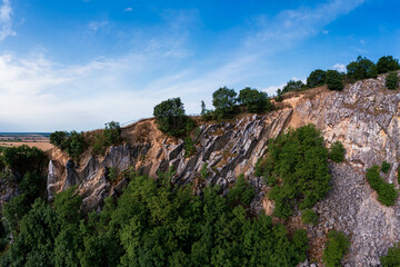 Amazing geologichal park with cliffs and lookout tower in aerial view. This is in Baranya count south Hungary. This place it was a stone mine in the past.
