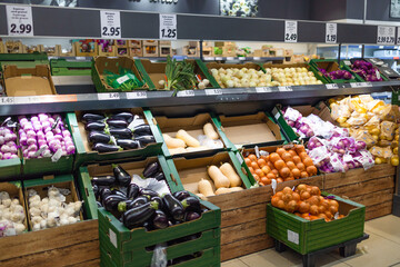Fresh vegetables on shelf in supermarket for background. 