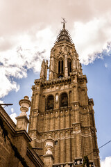 Fototapeta na wymiar Detail of the bell tower of the Cathedral of Toledo (Primate Cathedral of Saint Mary). Toledo, Castilla La Mancha, Spain
