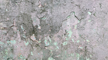 old vintage cement wall with cracked paint grunge texture background