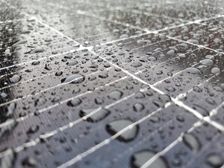 water drops on a photovoltaic panel surface