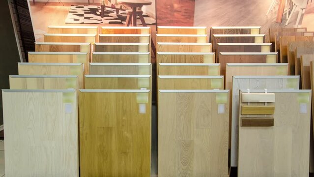 Top samples of various color palette - wooden floor timelapse stop motion. Themselves changing in storefront. Apearing and disapearing