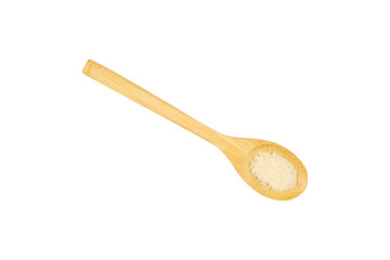 Sugar in a wooden spoon isolated