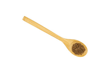 Cumin seeds in a wooden spoon isolated