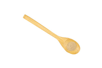 Pepper powder in a wooden spoon isolated