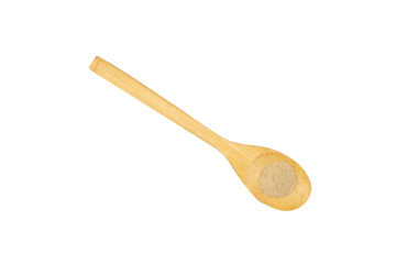 Pepper powder in a wooden spoon isolated