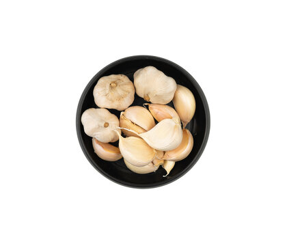 Garlic in a small bowl isolated. kitchen spice design elements
