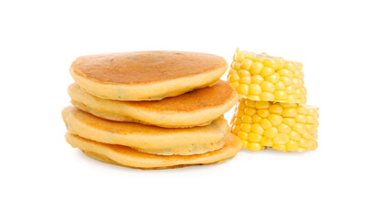 Stack of tasty corn pancakes and cobs isolated on white