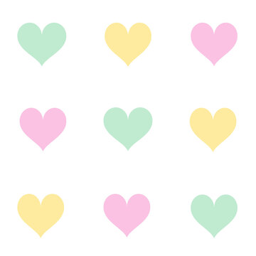 yellow, green and pink hearts on white ground seamless pattern background