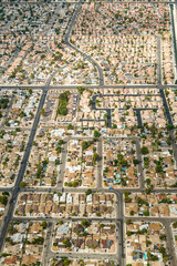Aerial view of a geometric residential area with bungalows. This suburban housing complex is in a geometrical form.