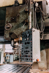 Old equipment, machines, tools in a rustic style in an abandoned mechanical factory