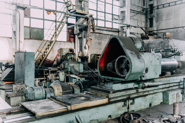 Old equipment, machines, tools in a rustic style in an abandoned mechanical factory