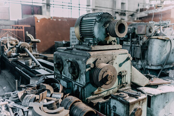 Fototapeta na wymiar Old equipment, machines, tools in a rustic style in an abandoned mechanical factory