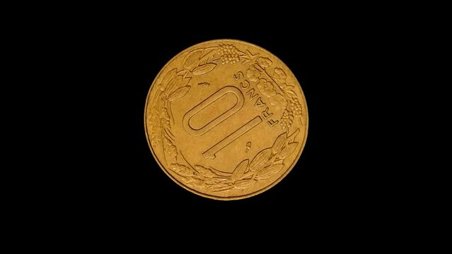 Reverse of Central Africa CFA coin 10 francs 1981, isolated in black background. 4k video