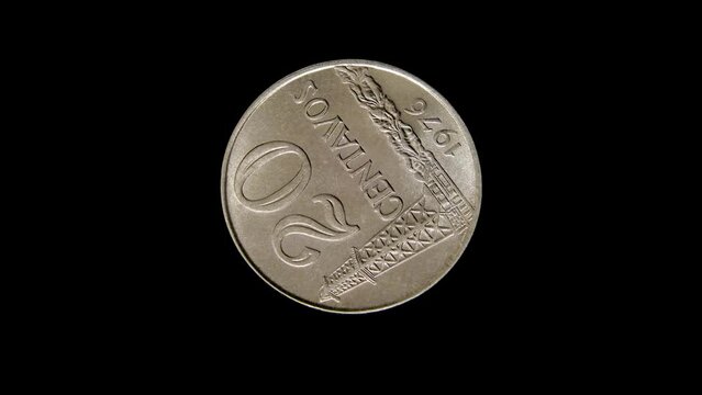 Reverse of Brasil coin 20 centavos 1976, isolated in black background. 4k video