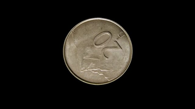 Reverse of Slovakia pre-euro coin 20 hellers, isolated in black background. 4k video