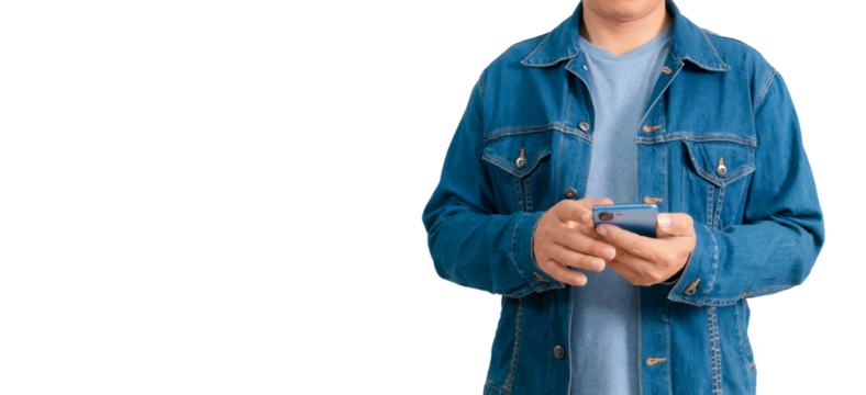 Asian man in shirt and jeans holding mobile phone