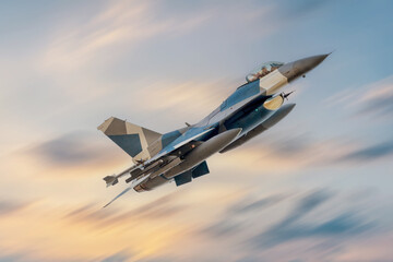 F-16 Falcon Fighter Jet in Flight. High speed Fast Jet military aeroplane on a combat mission flying towards the camera with afterburners, missiles and bombs. F16 single seat fighter for Ukraine
