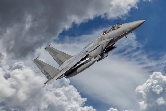 F-15 Eagle. Fighter Jet in Flight. Action photograph of Fast Jet military aeroplane on a combat mission McDonnel Douglas F15. USAF, Israel, Saudi Arabia