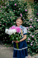 Fototapeta premium little girl with flowers